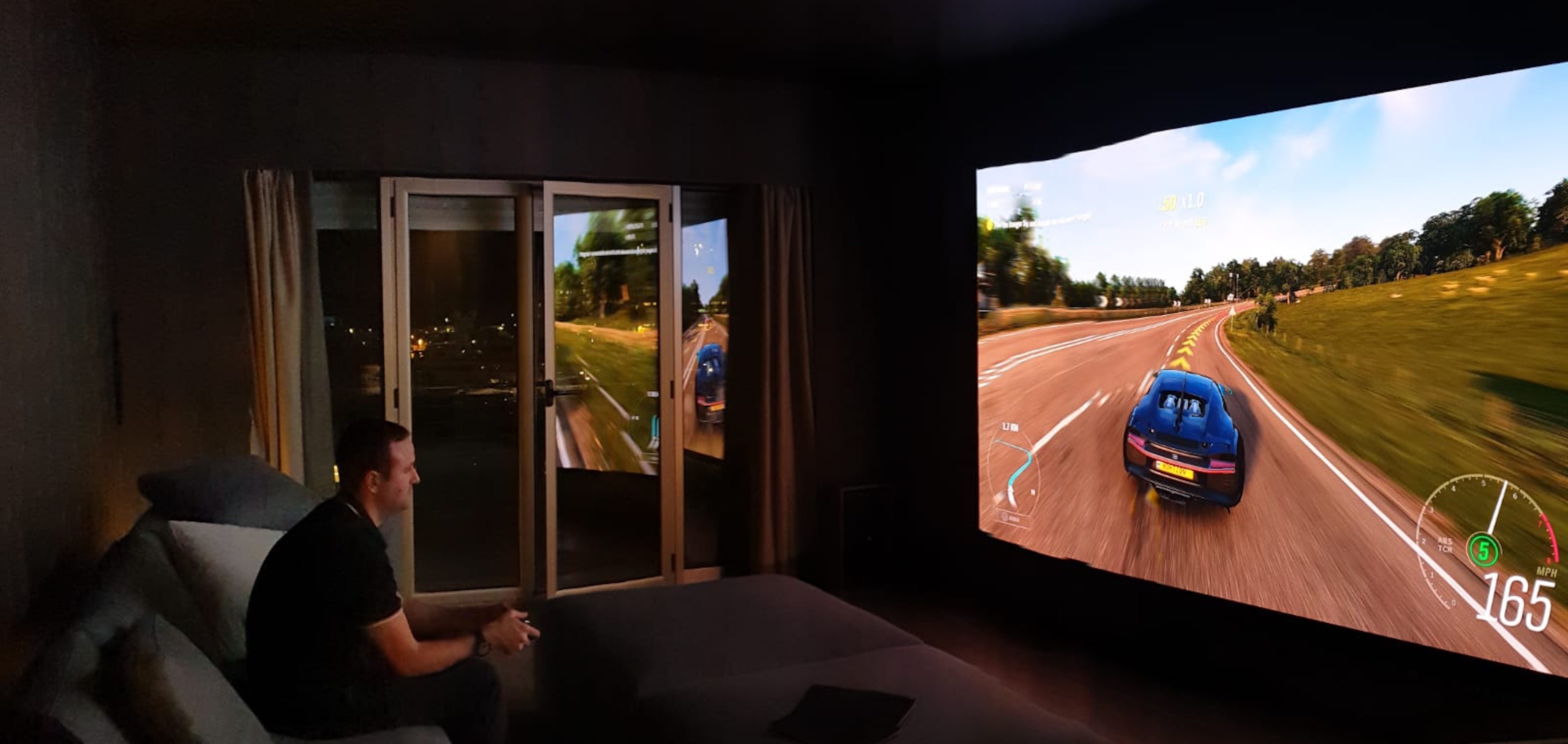 David playing Forza Horizon at Samsung's Monaco showroom
